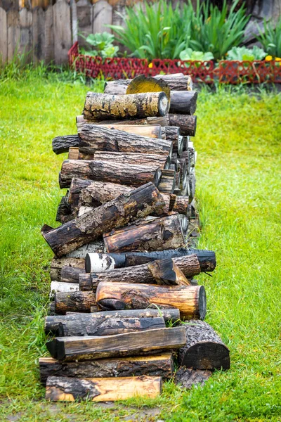 Firewood for the winter in the village — Stock Photo, Image