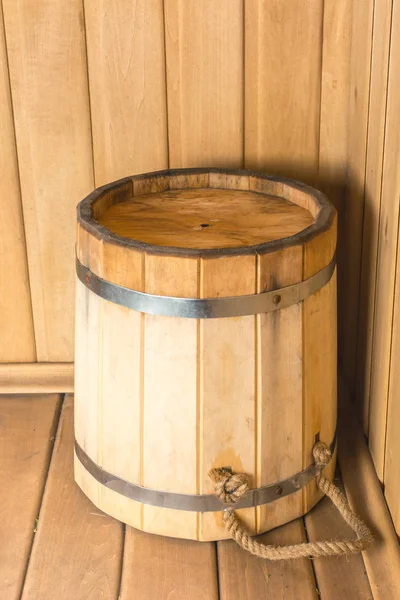 Wooden bucket in the sauna