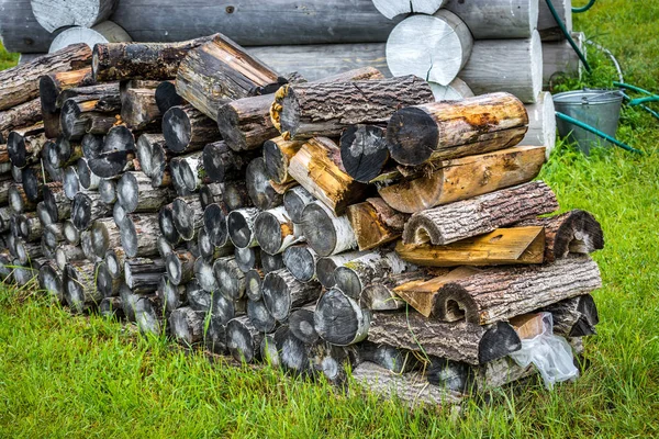 Firewood for the winter in the village — Stock Photo, Image