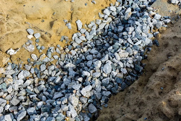 Die Steine Auf Dem Sand Für Eine Straße — Stockfoto