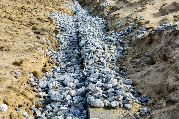 Die Steine Auf Dem Sand Für Eine Straße — Stockfoto