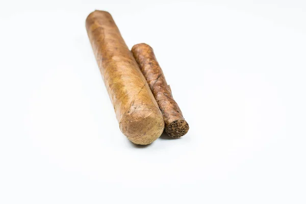 Two best cigars from twisted sheets on white background. — Stock Photo, Image