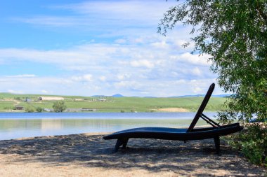 Rahatlamak için plaj dinlendiricisi.