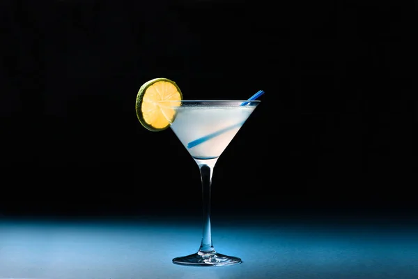 Classic Daiquiri cocktail on dark blue background