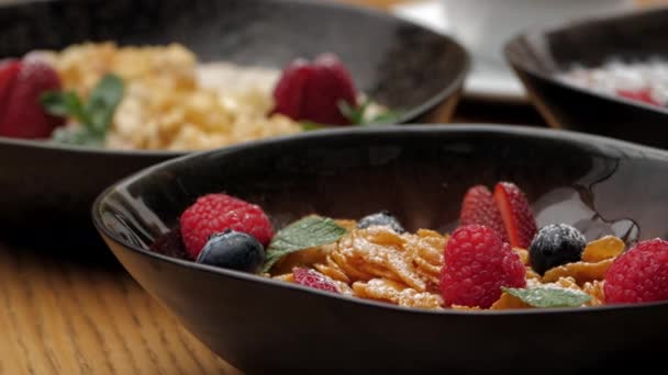 Corn Flakes Fresh Berries Raspberries Blueberries Strawberries Ceramic Bowl Close — Stock Video
