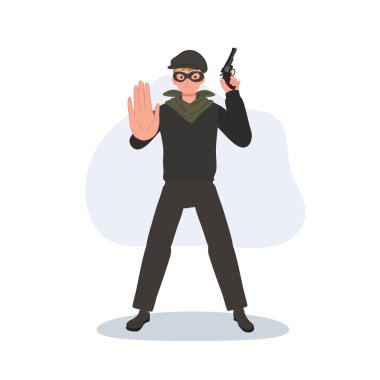 Hırsız hırsız maskeli silahlı adam. El hareketlerini durdur.