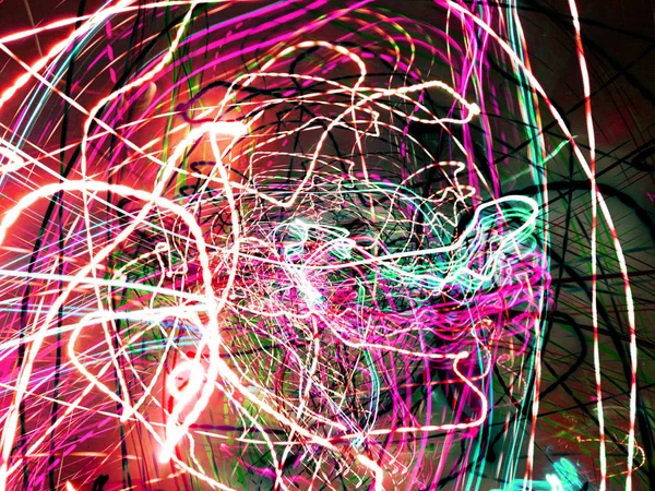 Light painting. Neon glow. Abstract blurred background. Colorful pattern.