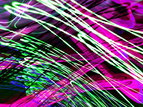 Light painting. Neon glow. Abstract blurred background. Colorful pattern.