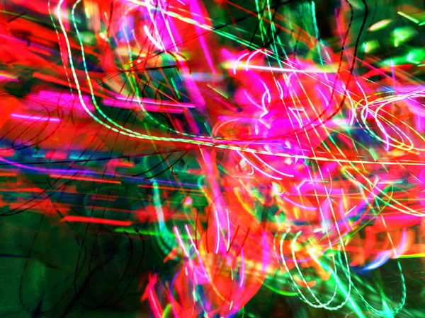 Light painting. Neon glow. Abstract blurred background. Colorful pattern.