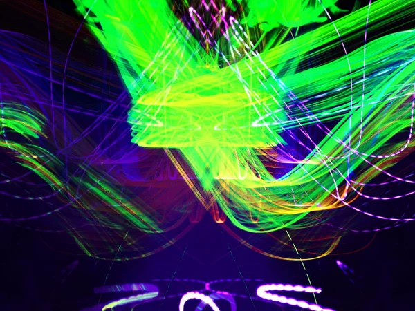 Light painting. Neon glow. Abstract blurred background. Colorful pattern.