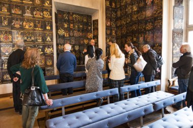Stockholm, Sweden A group visiting the  the House of Nobility or Riddarhuset. clipart