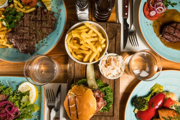 Stockholm Sweden Table Mixed Food Lile Steak Fries Burger Fish — Stock Photo, Image
