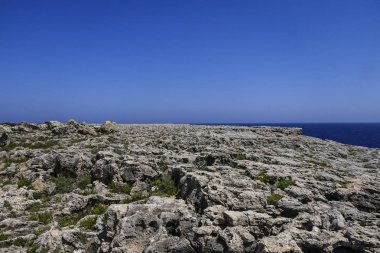 Syracuse, Sicilya, İtalya Capo Murro di Porco Deniz Feneri İyon Denizi'nde Sicilya'nın güney doğu ucunda Maddalena Yarımadası'nın sonunda bulunan aktif bir deniz feneri.