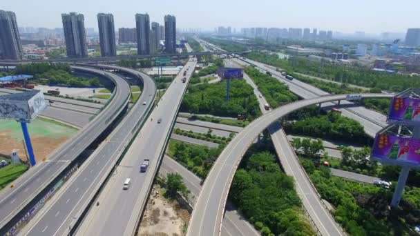 Xian, China, 16 May 2017, AERIAL shot of traffic moving on overpasses, Xian, China . — стоковое видео