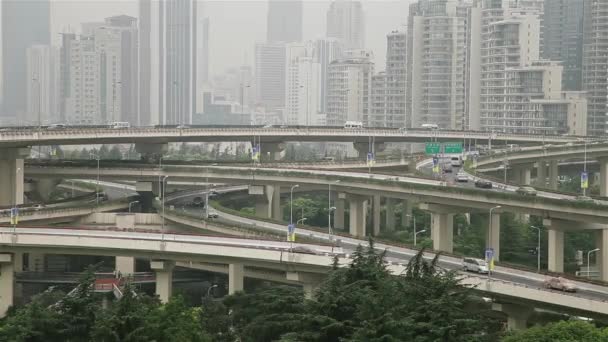Busy traffic over overpass in modern city , Shanghai, China — Stock Video