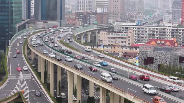 Busy traffic over overpass in modern city , Shanghai, China — Stock Video