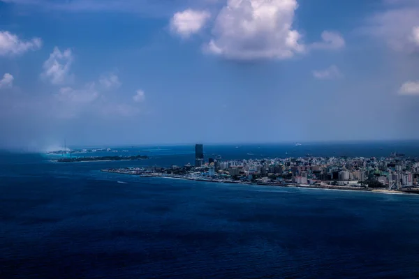 On this unique photo you can see the capital of the Maldives Male from above. You can see very well how a city looks in the smallest of spaces