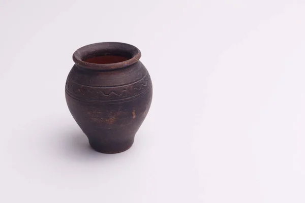 Earthen jar-isolated — Stock Photo, Image