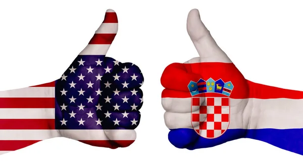 国家の関係を強化するという概念 両手には各国の国旗が描かれ 親指が立てられている クロアチアとアメリカ — ストック写真