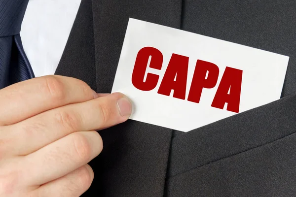 Bedrijfsconcept Zakenman Houdt Een Kaart Bij Tekst Capa — Stockfoto