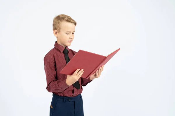 Pupil Holds Open Book His Hands Reads Isolated Background Education — Stock Photo, Image