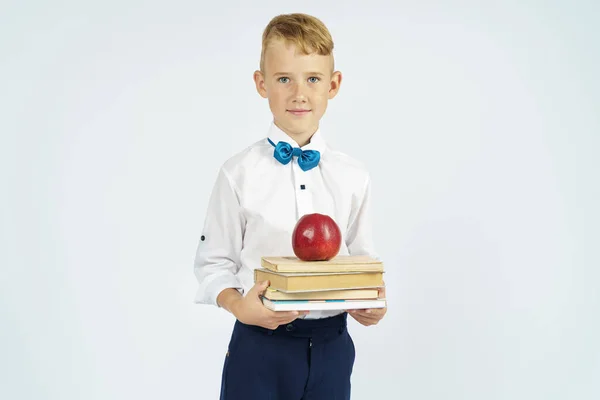 Écolier Tient Dans Ses Mains Des Livres Une Pomme Fond — Photo