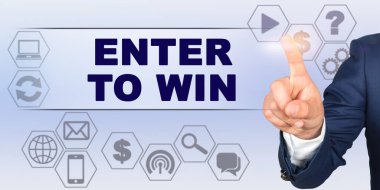 İş konsepti. İşadamı parmağıyla sanal ekrana dokunuyor. Ekran başlığı - Kazanmaya Giriş