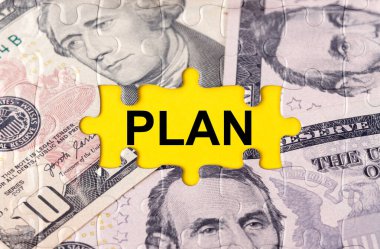 İş konsepti. Yazıtın ortasındaki doların görüntüsüyle bulmaca - Plan