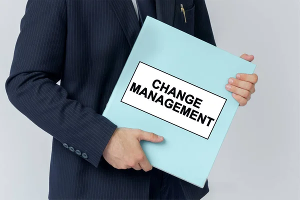 Business Concept Businessman Holds Folder Documents Text Folder Change Management — Stock Photo, Image