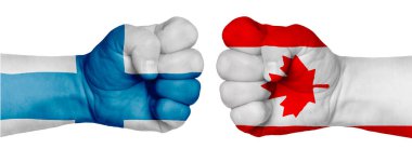İnsanların mücadelesi kavramı. İki el birbirine kenetlenir ve birbirlerinin karşısındadır. Ülkelerin bayraklarının renklerine boyanmış eller. Kanada - Finlandiya