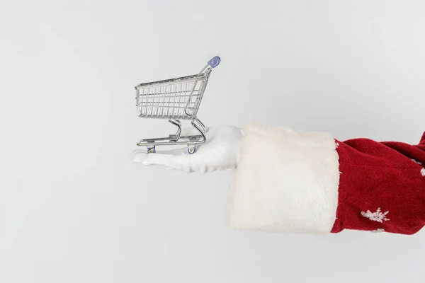 Holidays Christmas Concepts Santa Claus Holds Cart His Hand Isolated — Stock Photo, Image