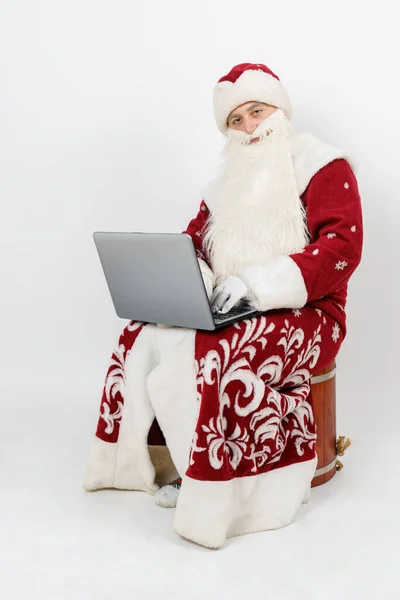 Christmas New Year Concept Santa Claus Sits His Desk Works — Stock Photo, Image