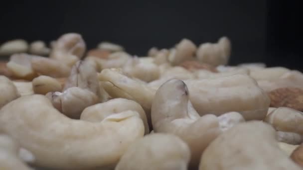 The camera moves slowly between the cashews — Stock Video