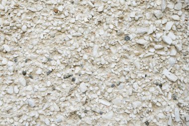 taş kırıntıları ile kaplı beton duvar