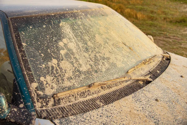 dry dirt on car windshield