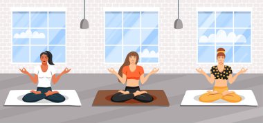 Yoga dersi uygulayan genç sportif kadınlardan oluşan bir grup. Sevimli kızlar lotus duruş ve meditasyon oturan. Fitness sınıfı.