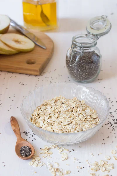 Ingredients Healthy Breakfast Chia Seeds Oatmeal Cereals Apple White Table — Stock Photo, Image