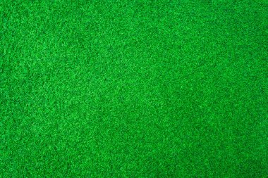Yapay yeşil çimen veya spor alanı dokusu arkaplanı.