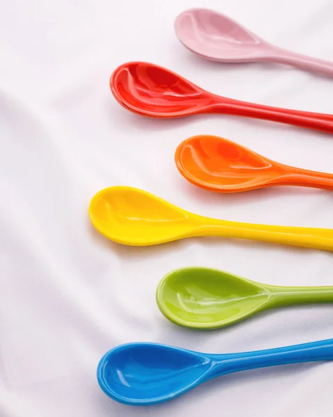 Colors Ceramics Spoon White Fabric Background Colorful Concept — Stock Photo, Image