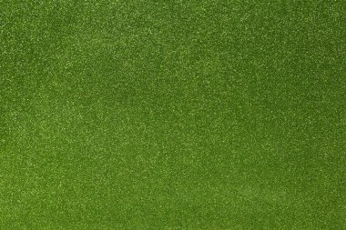 Soyut yeşil ışıltılı doku arka plan. Hediye kutunuzu veya parti dekorasyonunuzu büktek için parlayan parlak kağıt.