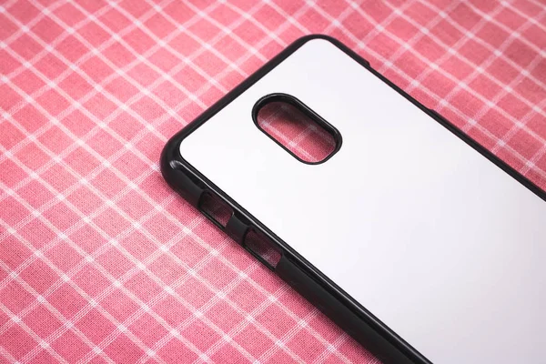 Zwarte Mobiele Cover Roze Tafelkleed Achtergrond Achteraanzicht Van Telefoon Hoesje — Stockfoto