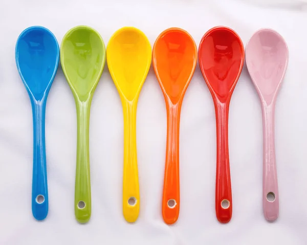 Colors Ceramics Spoon White Fabric Background Colorful Concept — Stock Photo, Image