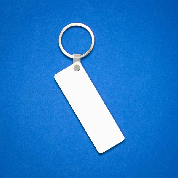 White Key Ring Blue Background Key Chain Your Design Hanging — Stock Photo, Image