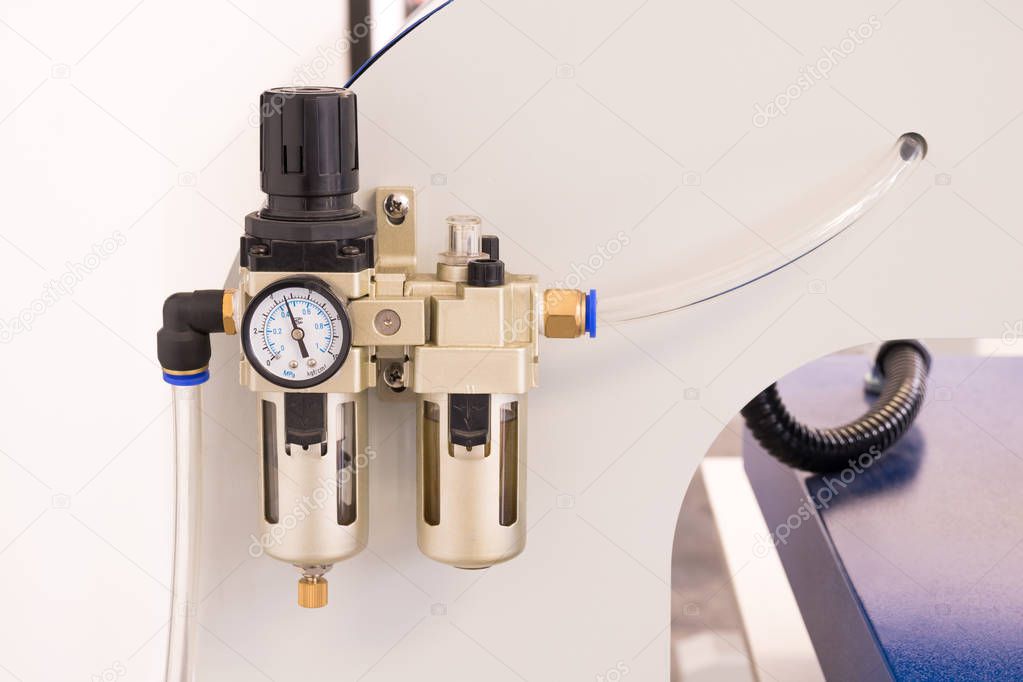 Pneumatic valve meter or pressure control machine.