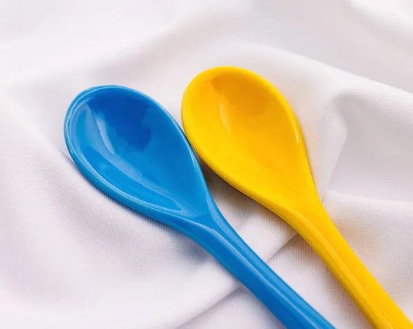 Colors Ceramics Spoon White Fabric Background Colorful Concept — Stock Photo, Image