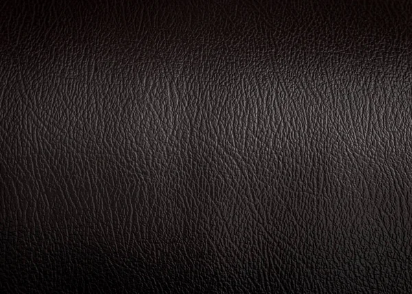 Siyah deri doku arka plan yüzeyi. Hayvan derisinden yapılmış lüks malzeme.