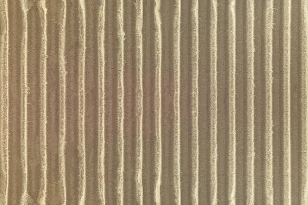 Oluklu mukavva doku arka plan. Doğal malzemeden yapılmış zanaat kağıt detay.