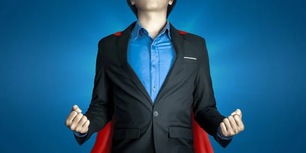 Super business man wears black suits and red robes with super heroes coaching concept on shine blue background and smart. Investors receive a lot of profits with business success.
