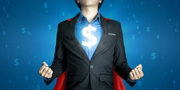 スーパービジネスマンは 多くのお金のドルの背景と富にスーパーヒーローの勝者のコンセプトと黒いスーツと赤いローブを着用しています 投資家は ビジネスの成功で多くの利益を受け取ります ロイヤリティフリーのストック画像