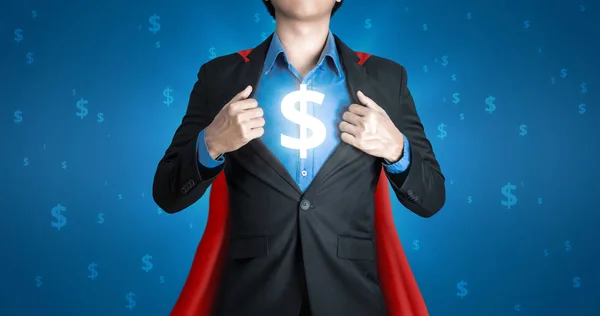 Super business man wears black suits and red robes with super heroes winner concept on a lot of money dollars background and riches. Investors receive a lot of profits with business success.